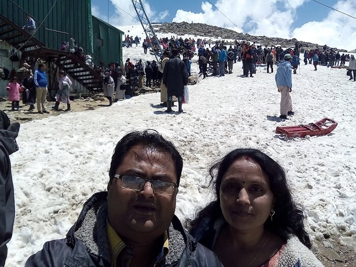 rakesh and his wife enjoy the gondola ride in gulmarg