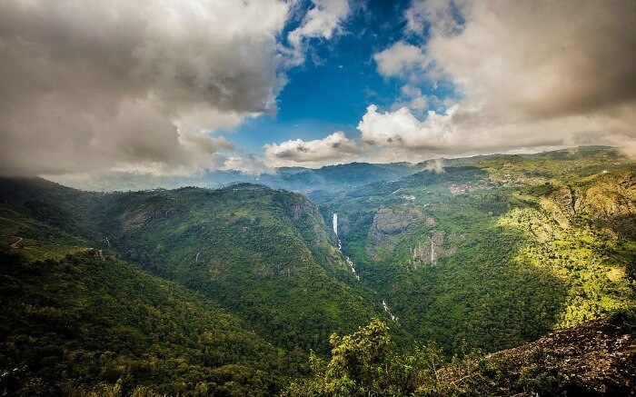 Gorgeous Catherine Falls in the mountains covered by clouds