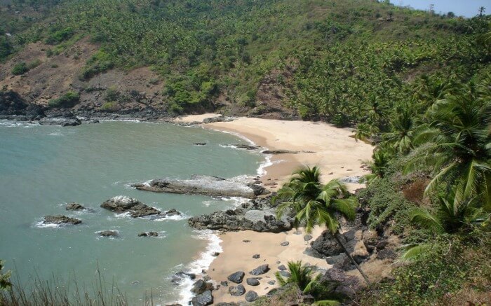 Kakolem Beach surrounded by palm trees