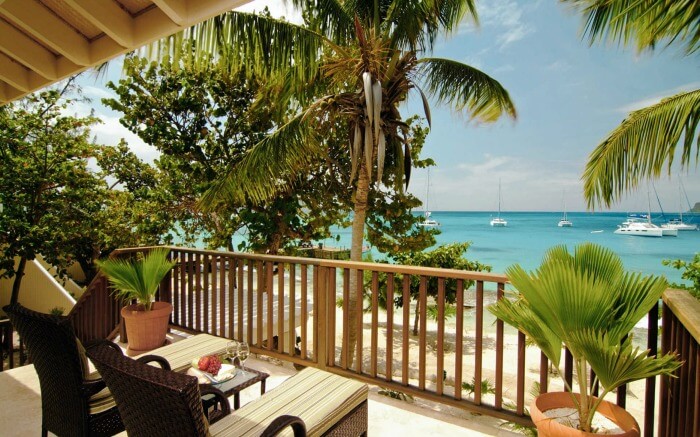 a balcony of a resort overlooking the sea