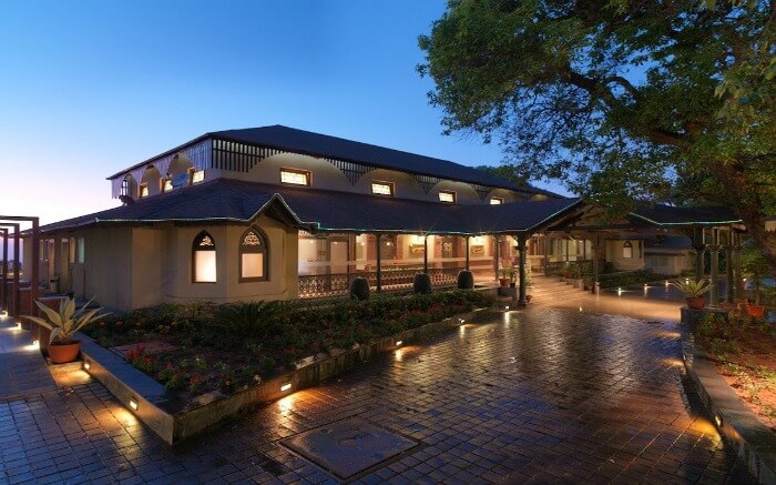 A hotel premises well lit at night