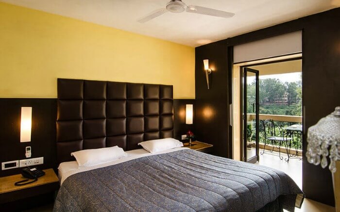 A luxurious king size bed in a hotel room