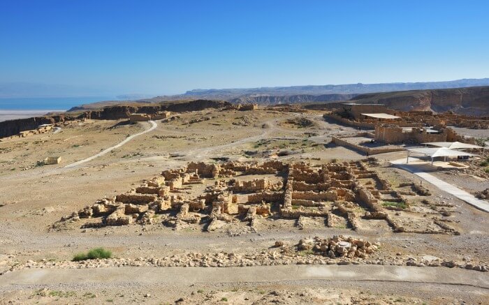 A view of ruins of the zealot fortress Masada with the Dead sea in background