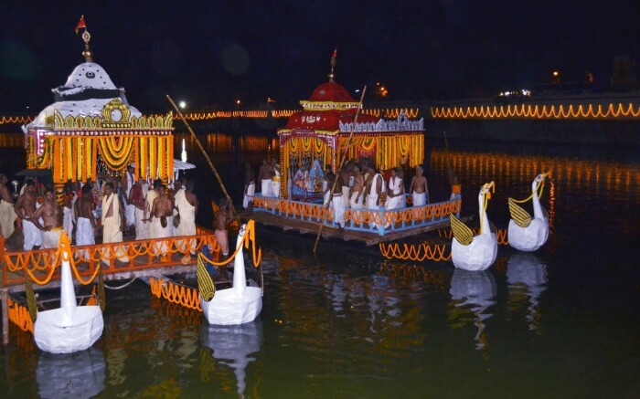 Decorated boats on a river during a festival in Tripura