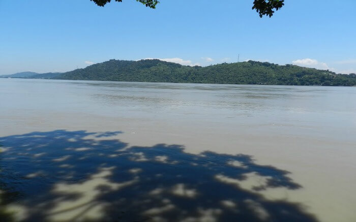 Kamakhya Hills from a beach s
