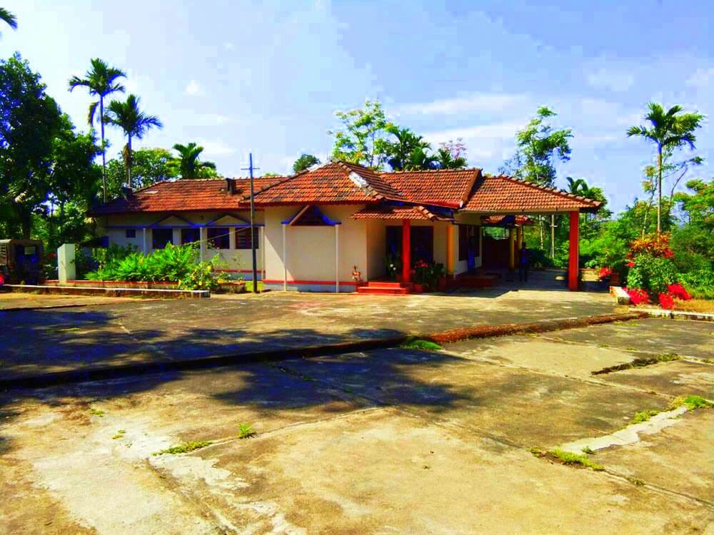 an old style Karnataka homestay with a grand veranda