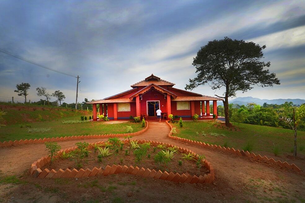 a beautiful home with a tree by its side