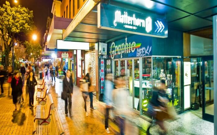 People walking past the shops in Cuba Street in Wellington