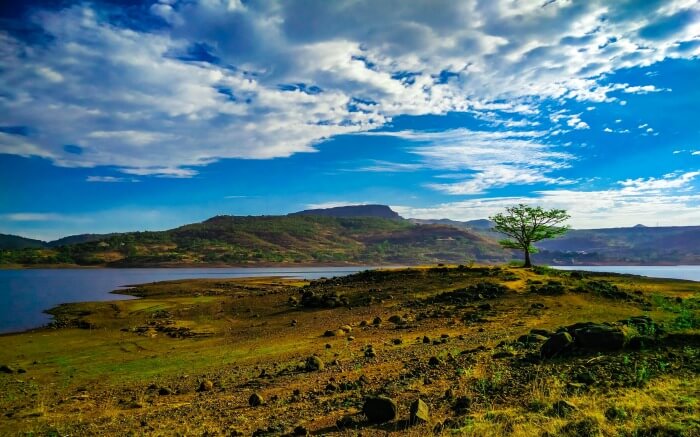 clouded sky and a beautiful lake in mountains