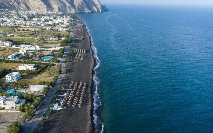 Aerial version of Perissa Black Sand Beach
