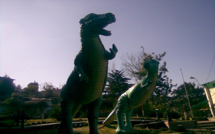 Dinosaur statues in an amusement park