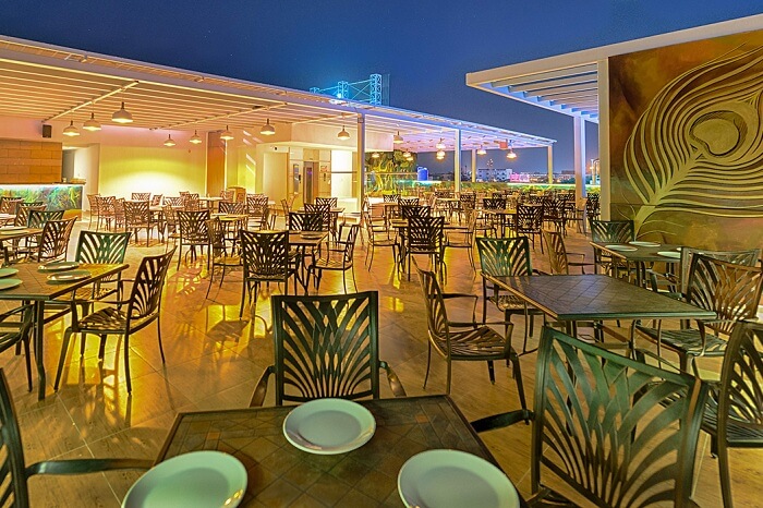 A night shot of the rooftop restaurant of Hotel Chenthur Park in Coimbatore