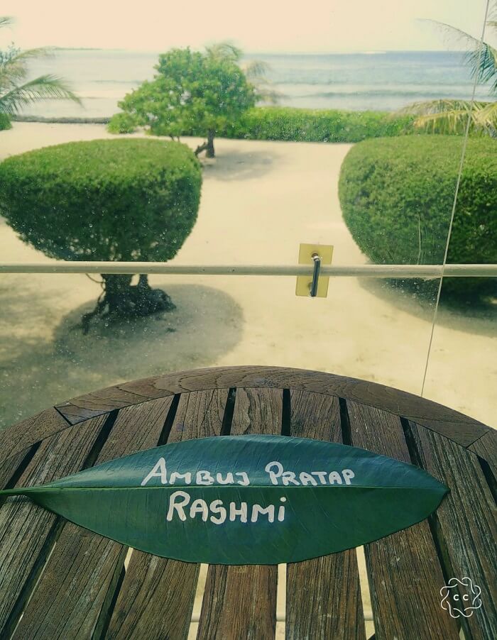 ambuj rashmi name on leaf with a view of maldives sea