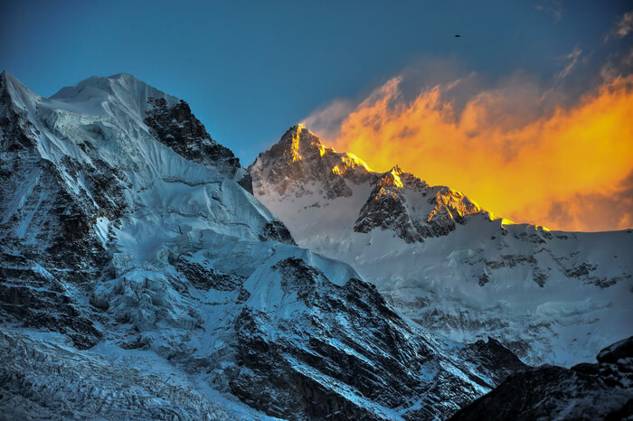 Sunset behind the snowclad mountains