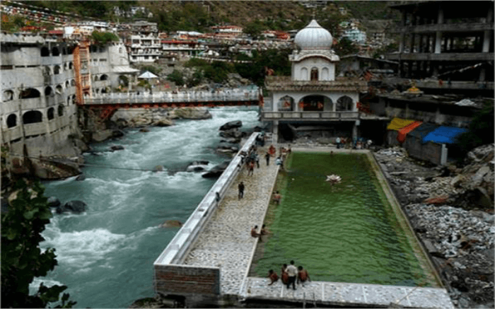 People taking a dip in Vashisht Hot Spring in Manali