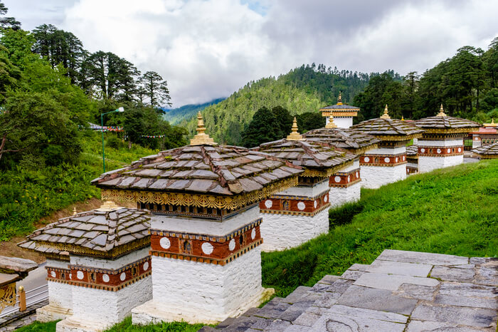 beautiful chortens on green hillside