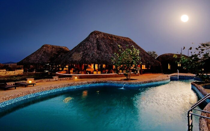 Hut beside the pool at Masai Mara Sopa Lodge in Kenya