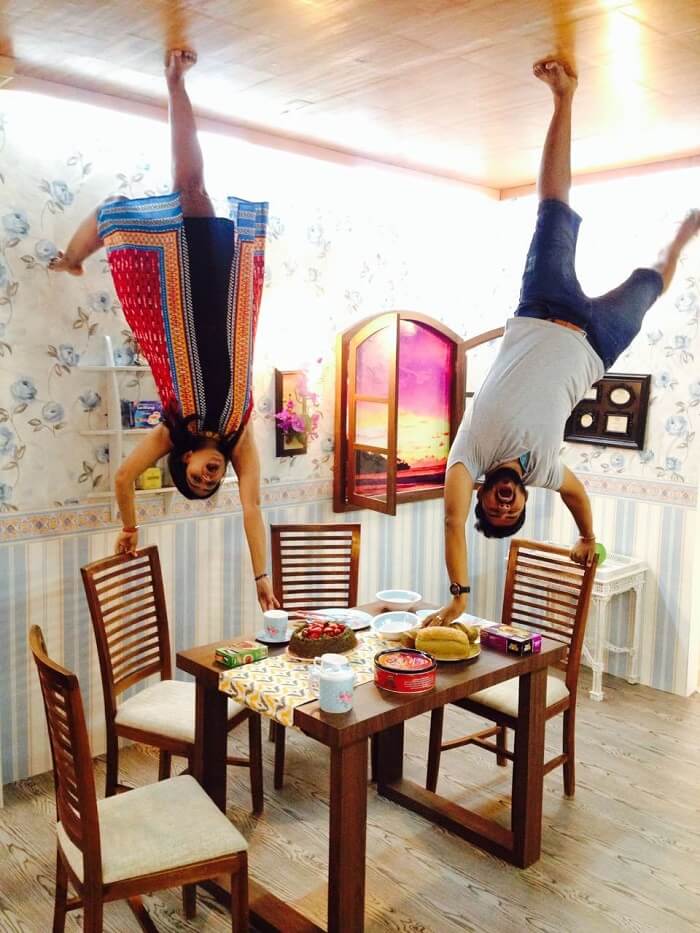 nirav & his wife enjoying at Upside Down museum in Bali
