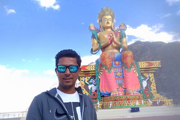 ninad near monastery and huge Buddha statue