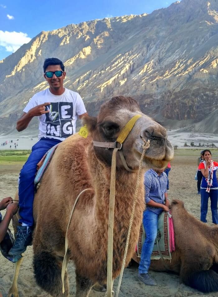 ninad riding camel in nubra