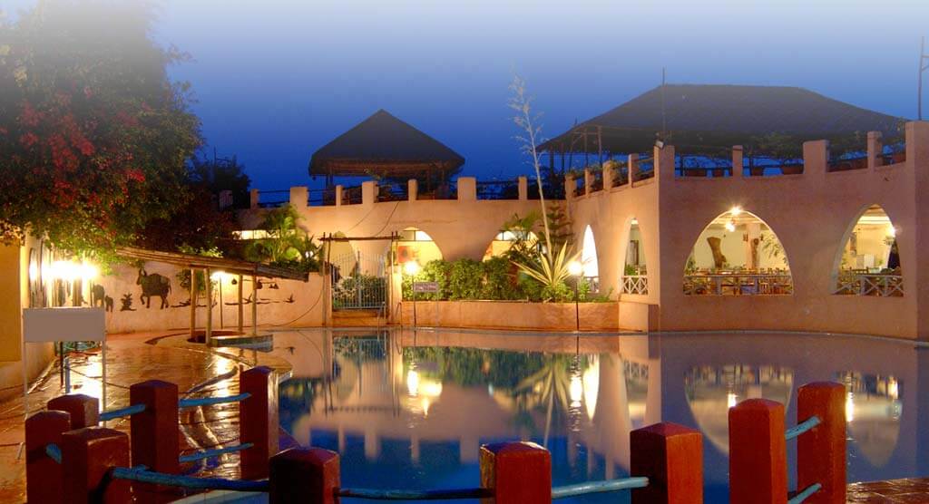 a beautiful resort with a big swimming pool