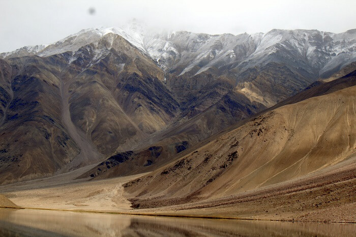 barren mountains at chandra taal lake