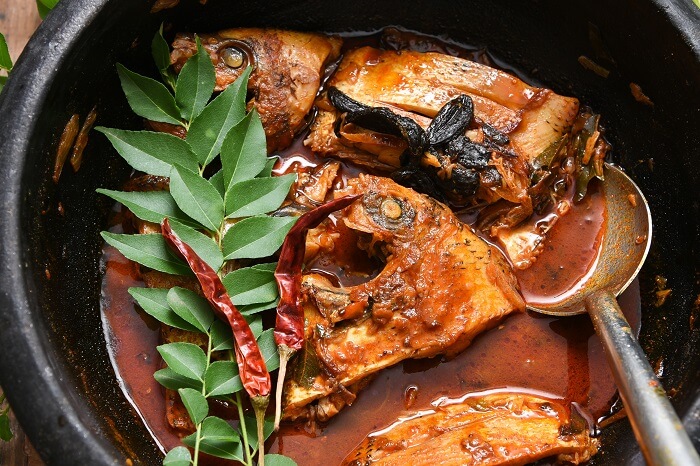 eat spicy Karimeen Pollichathu in kerala