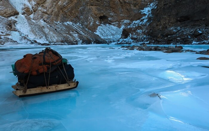 Luggage loaded on a sled over the frozen Zanskar river in Kashmir ss30102017