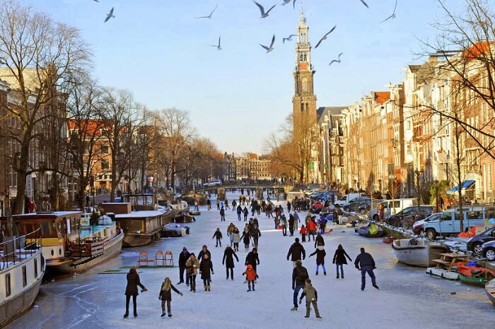 Go ice skating in Amsterdam’s frozen canals in winter