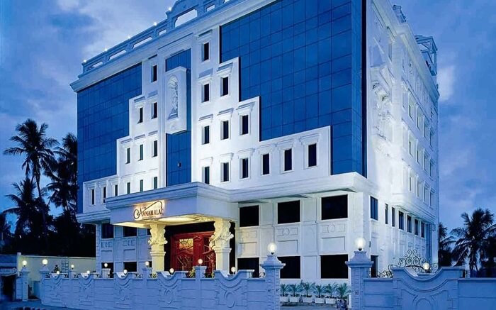 A white and blue beautiful building of Annamalai hotel