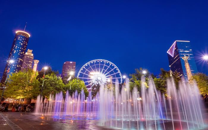 Beautiful fountains with buildings in background