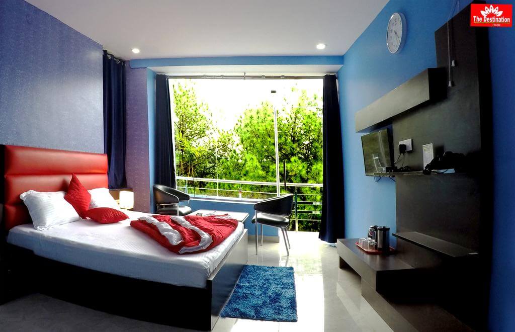 a hotel room with big window