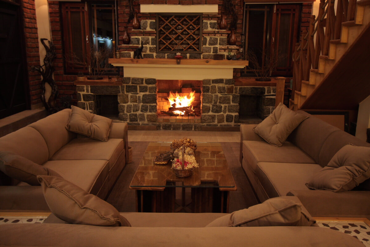 a fire place inside a hotel room in Dharmshala