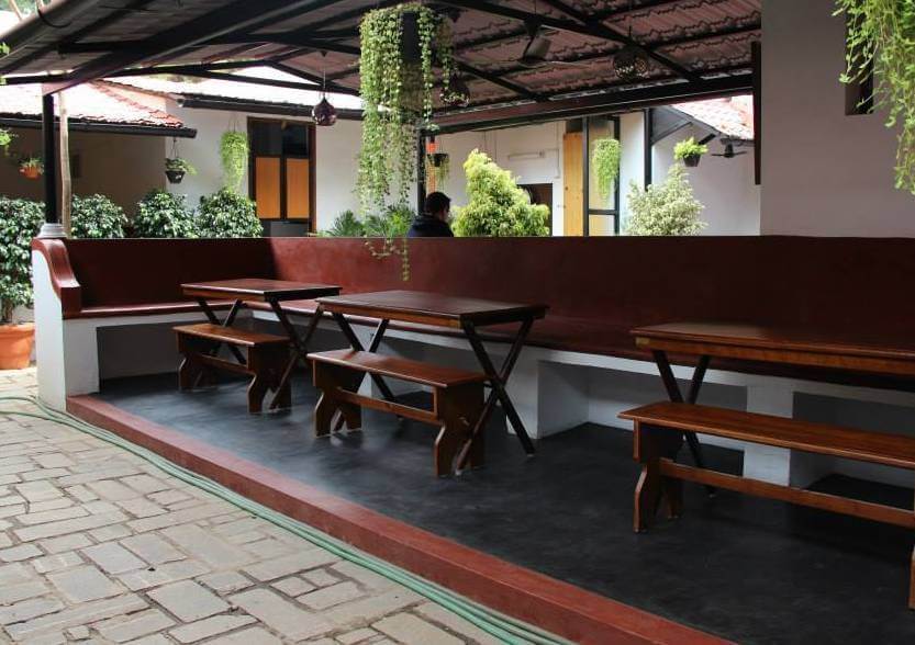 wooden seating in Duy Art Cafe