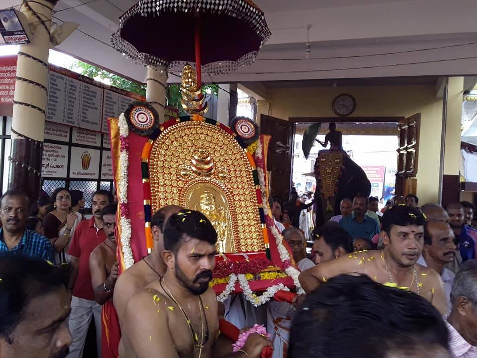 people praying inside a temple