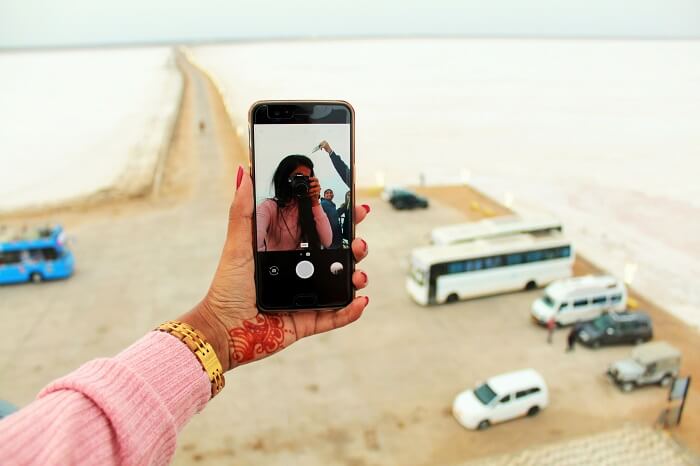 Female traveler taking selfie