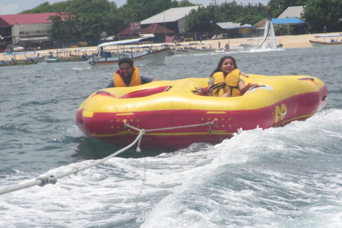 tushar honeymoon trip to Bali: tushar & wife tube ride