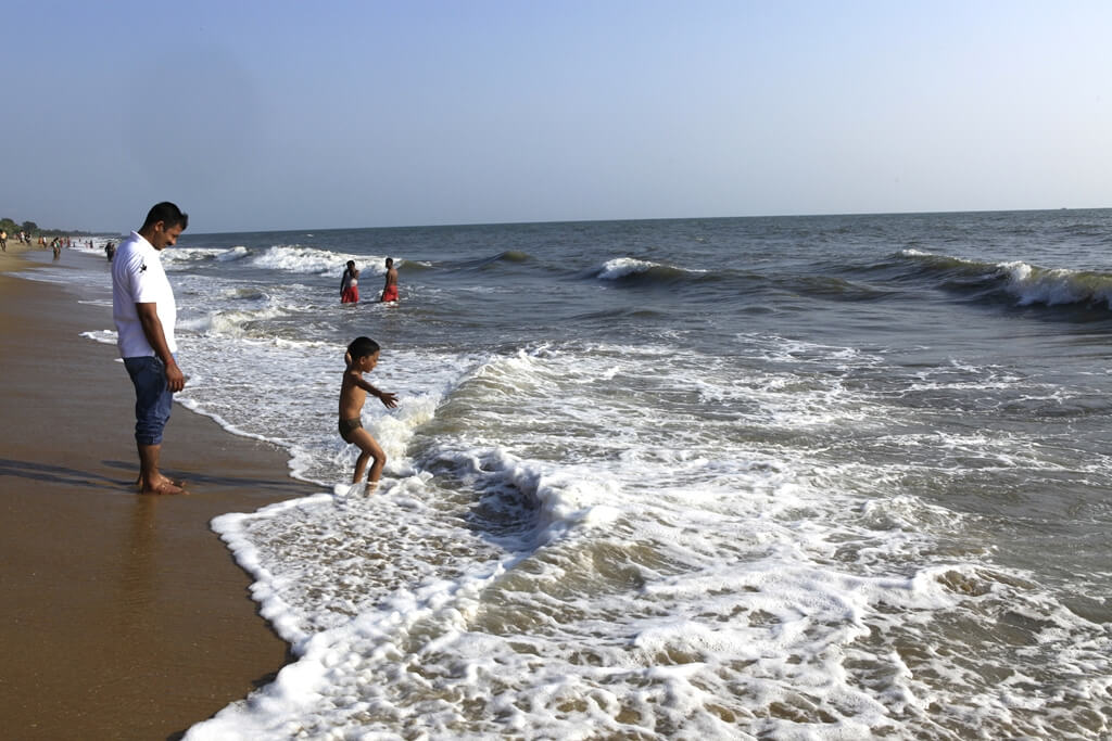 people playing in sea waves