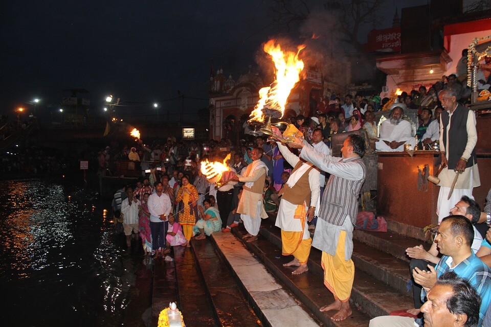 priests doing aarti at the ghat
