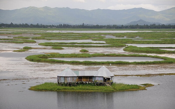 a gorgeous floating lake with a house ss01052018