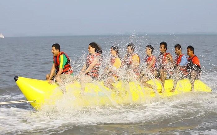People enjoying a ride on banana boat