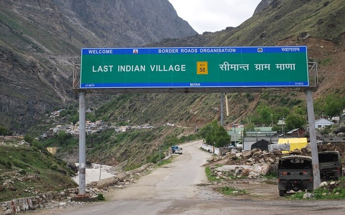 Welcome sign board of Mana Village
