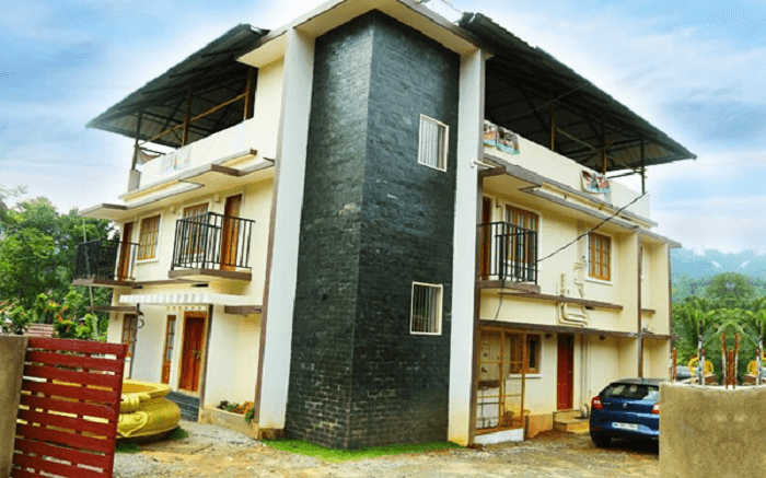 a cottage of Ayursakthi Riverdale Resort