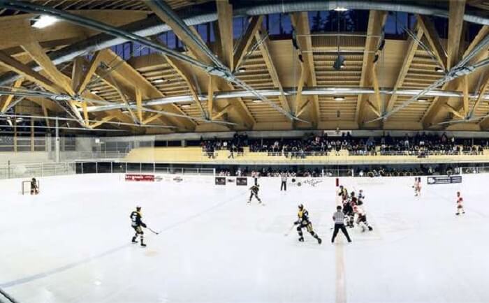 people ice skating in a skating center