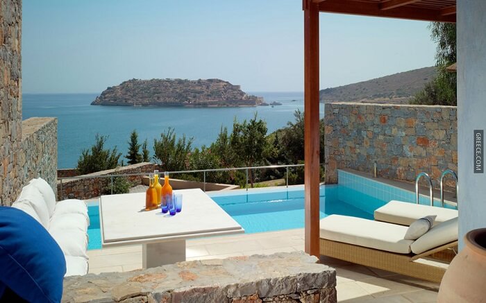 pool cum sitting area overlooking the sea in Greece