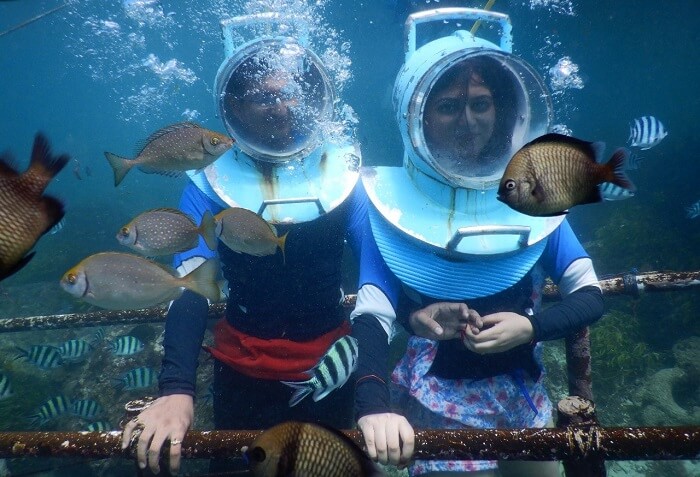 Couple enjoying seawalking in Bali