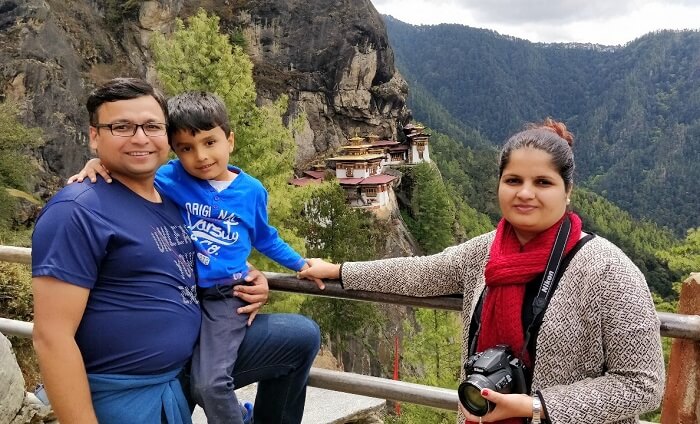 rohit bhutan family trip travelogue posing before tigers nest