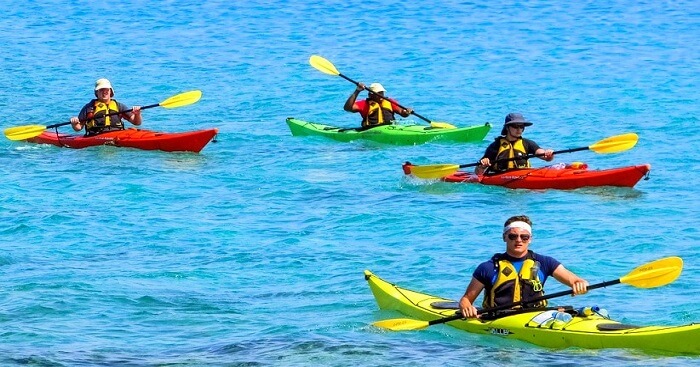 friends rowing a kayak in the malaysian waters