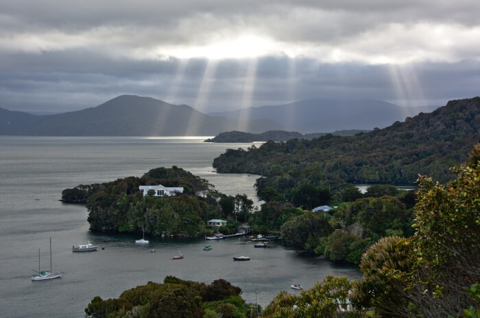 Sunbeams over islands Faith, Hope, and Charity