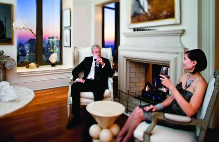Get cozy with your loved one at an outdoor fireplace